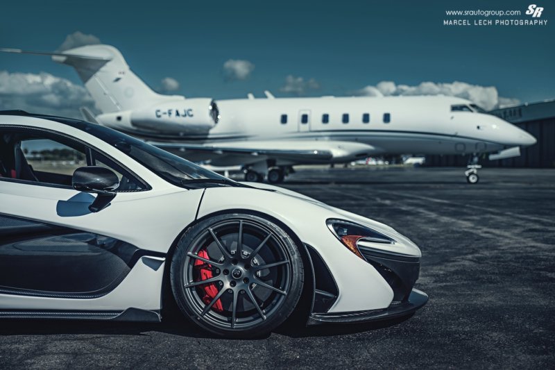 15-awesome-white-mclaren-p1-race-mode-front-wheel-red-brake-caliper-white-jet-background