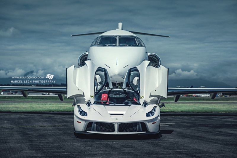 22-white-ferrari-laferrari-front-view-doors-up-jet-background