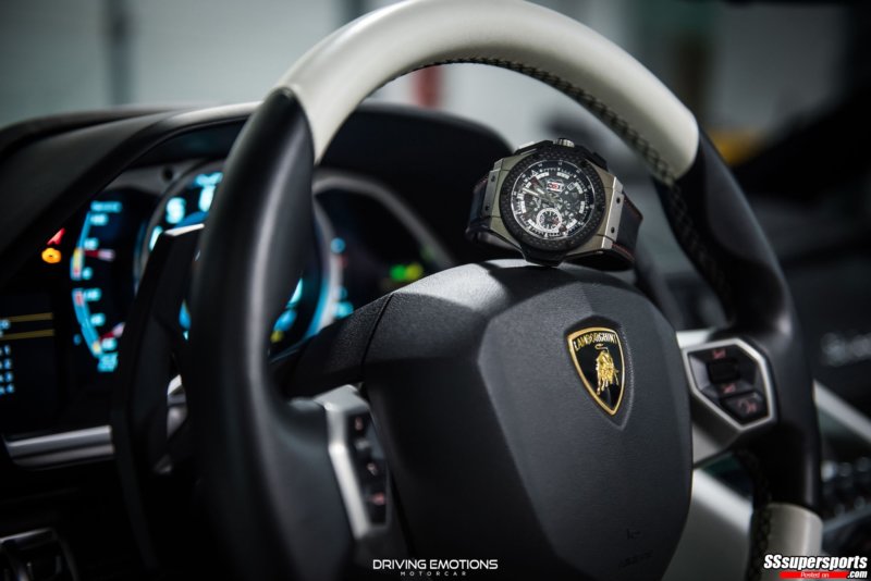 2-white-on-white-lamborghini-aventador-roadster-steering-wheel-wristwatch