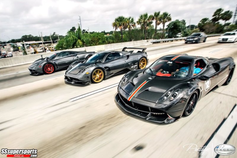 6-pagani-huayra-la-monza-liza-huayra-bc-and-grey-huayra-red-wheels-driving-road