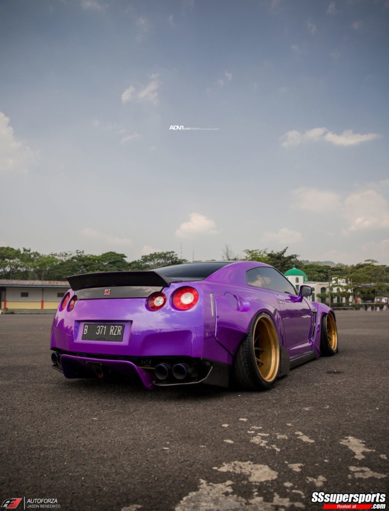 6-purple-pandem-rocket-bunny-nissan-gtr-r35-nismo-on-adv1-wheels-rear-side-view