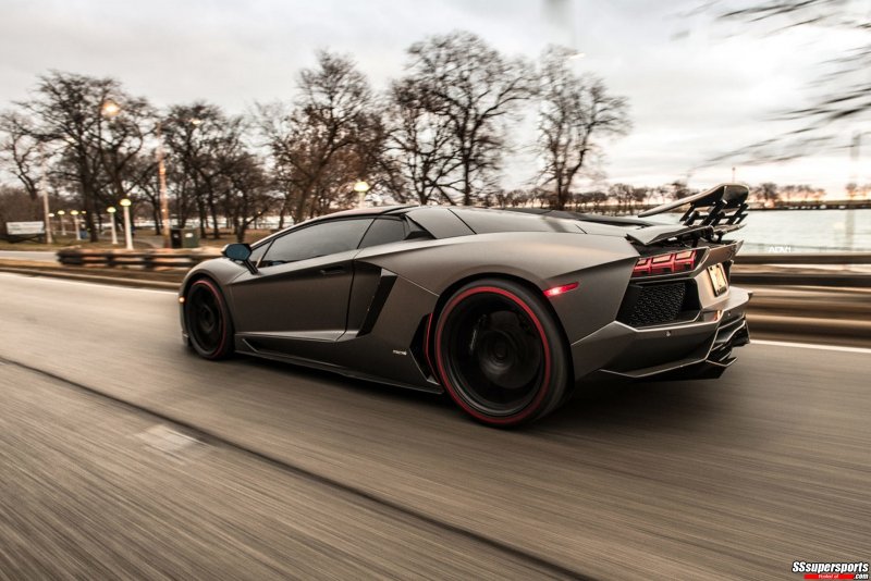 19-frozen-gray-dmc-lamborghini-aventador-roadster-on-adv1-wheels-side-view-on-the-road