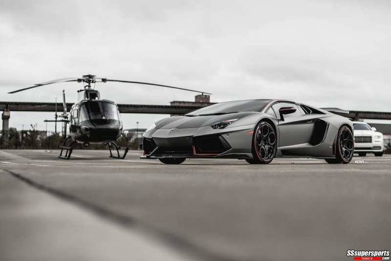 8-frozen-gray-dmc-lamborghini-aventador-roadster-on-adv1-wheels-front-side-view